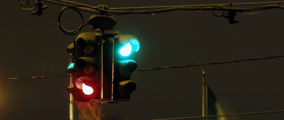 Inverted colors traffic signal cluster in the Tipperary Hill section of Syracuse, New York, 2005