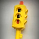 Photo of a Little People traffic light with red on the bottom