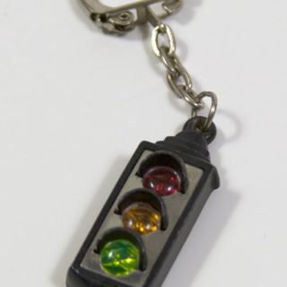 Plastic keychain, likely from the 1970s
