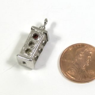 Bracelet charm with spinning inner signal part