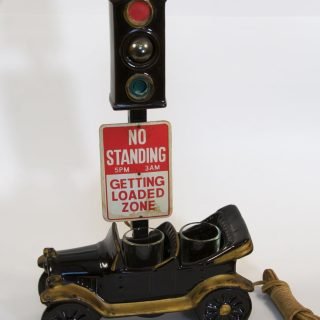 Ceramic car with shot glasses and 120-volt signal with bulb for yellow light by Enesco, Japan