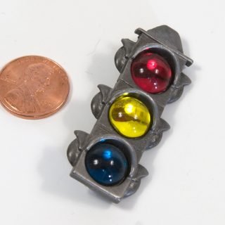 Pewter pin with lucite stones and AJC mark, circa 1983
