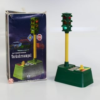 Plastic traffic light. Battery-operated manually selectable. By Focus Enterprises Co. Ltd #2620. Made in China.
