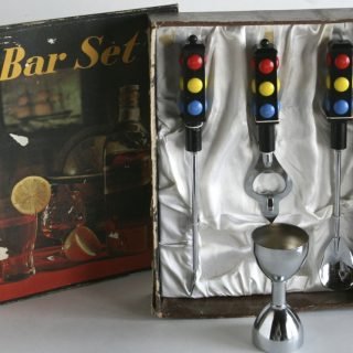 Bar Set contains a shot mixer, stirrer, bottle opener, and ice picker. No company name on the box or items.