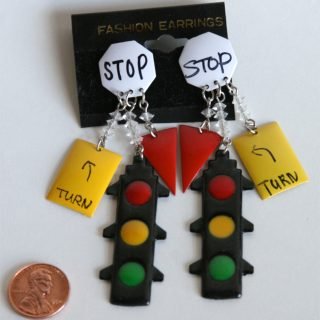 Earrings with extra signs