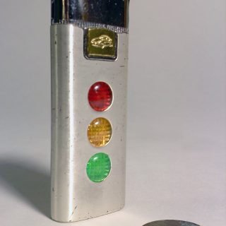 Chrome and aluminum butane lighter with working lights