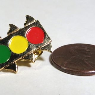 Gold-tone pin with painted lenses