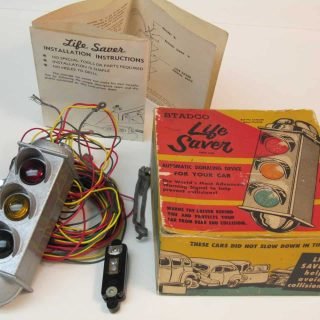 Stadco Life Saver vehicle speed indicator for car rear window, 1951, with box and instructions