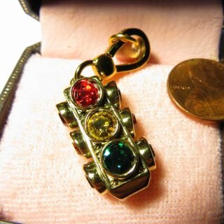 Juicy Couture 3-way traffic light with rhinestone indications and engraved "Stop for Style" on back