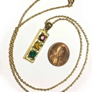 Gold tone traffic light necklace