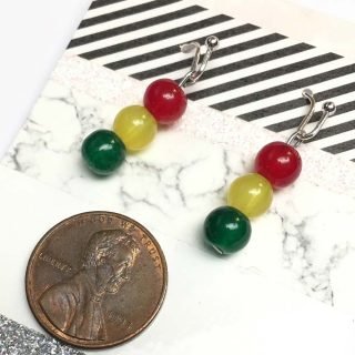 Red, yellow, and green stacked beads as dangle earrings representing a traffic light