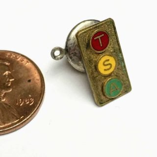 Brass TSA traffic light tie tack