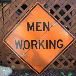 Photo of a foldable Men Working sign