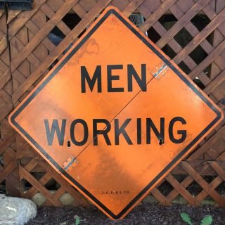 Photo of a foldable Men Working sign