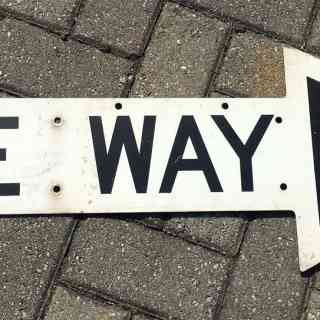 Photo of a One Way sign from the 1950s
