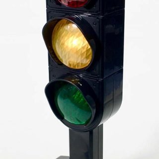 Plastic unbranded oval battery powered blinking and beeping/melody traffic light