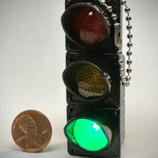 Black blinking traffic signal key chain from China